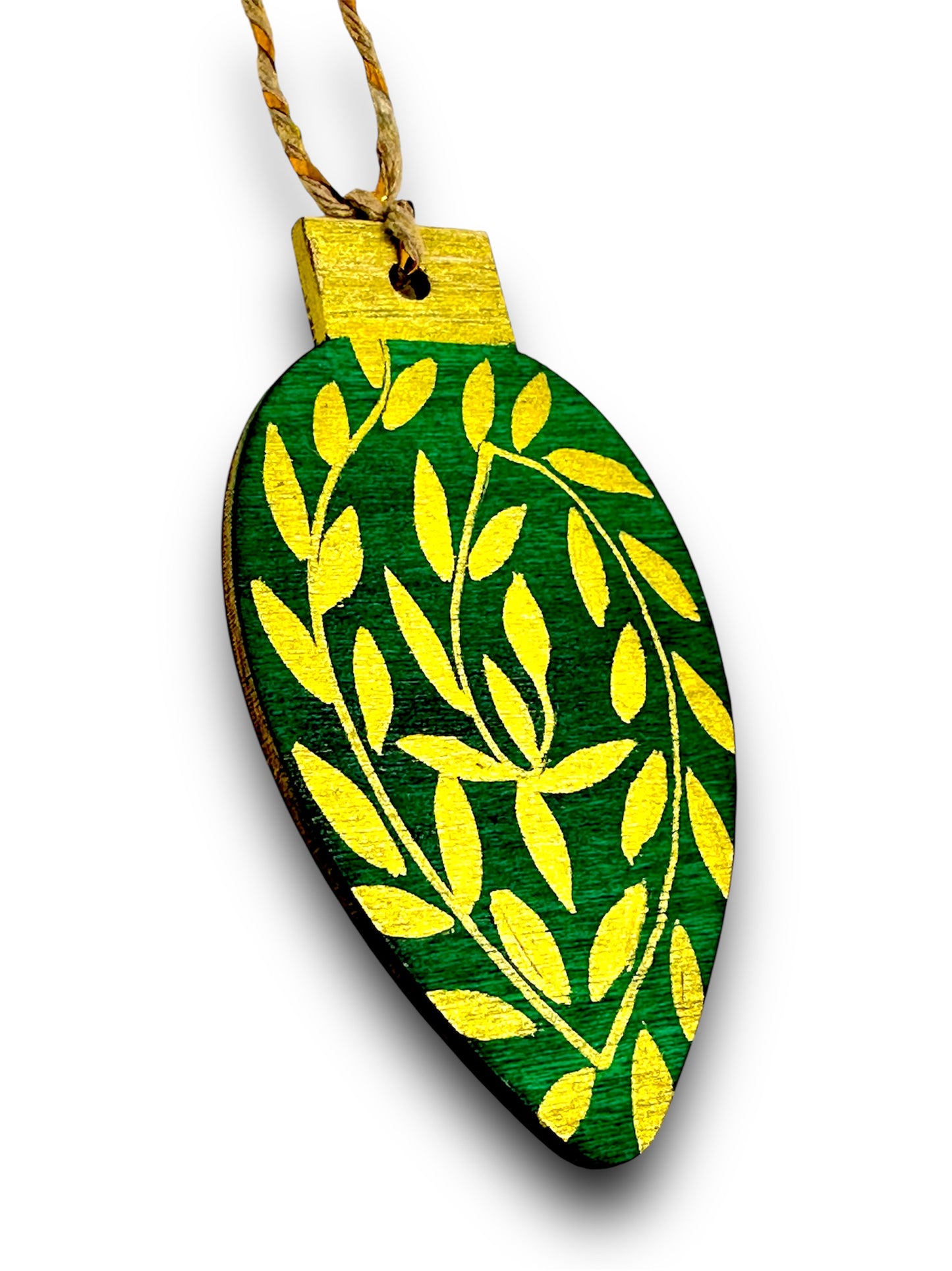 Green and gold wooden Christmas tree decoration.