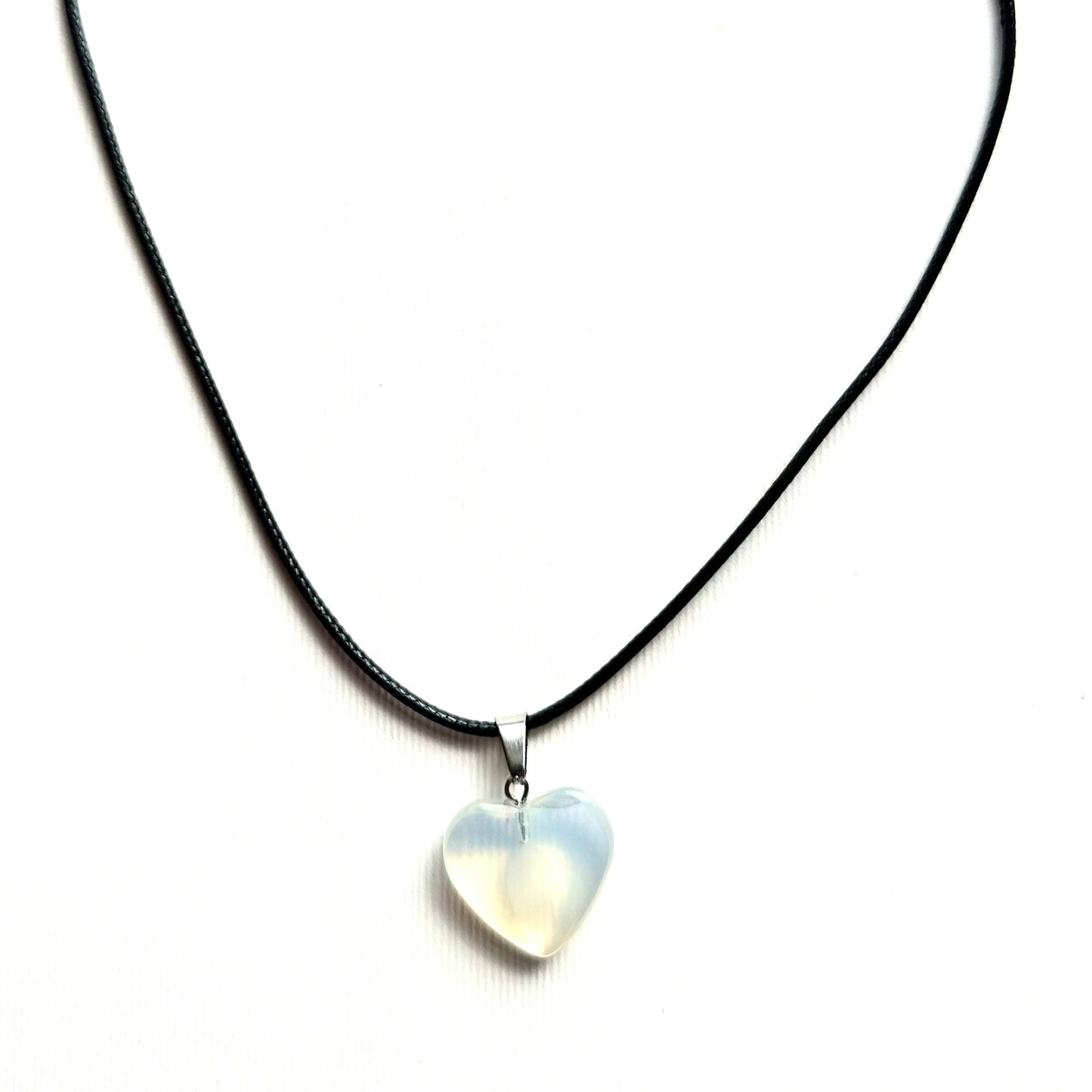 Heart necklace ( transparent with milky white parts, natural stone)