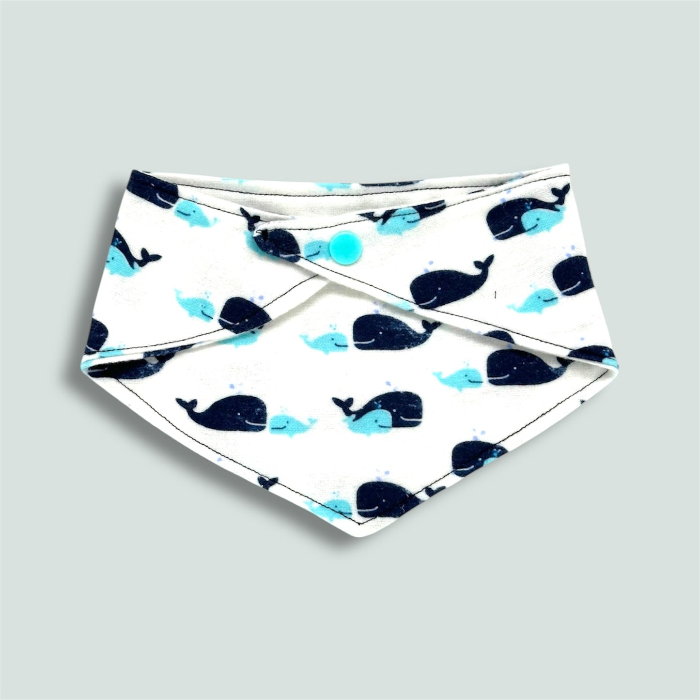 Baby bib with whale design. Unisex.