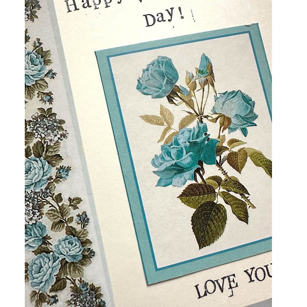 Happy Valentine’s Day card with blue roses.
