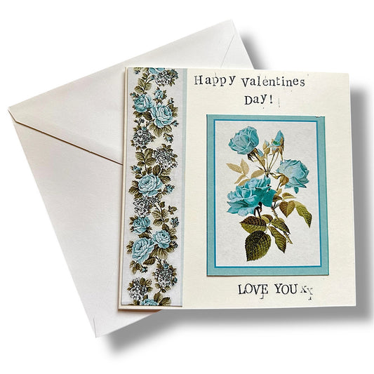 Happy Valentine’s Day card with blue roses.