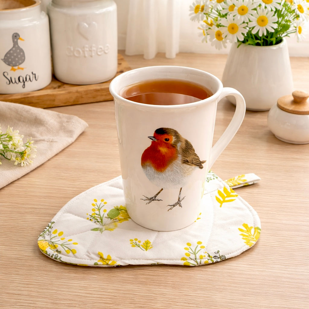 Quilted fabric leaf coaster.