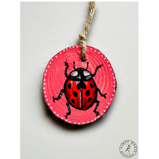 Ladybird wood slice art hanging decoration.