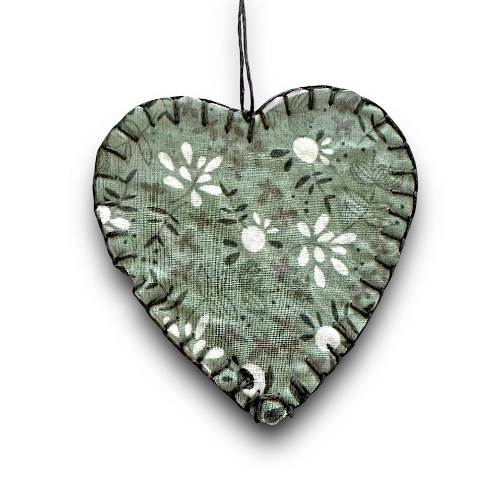 Sage green botanical hanging heart decoration.