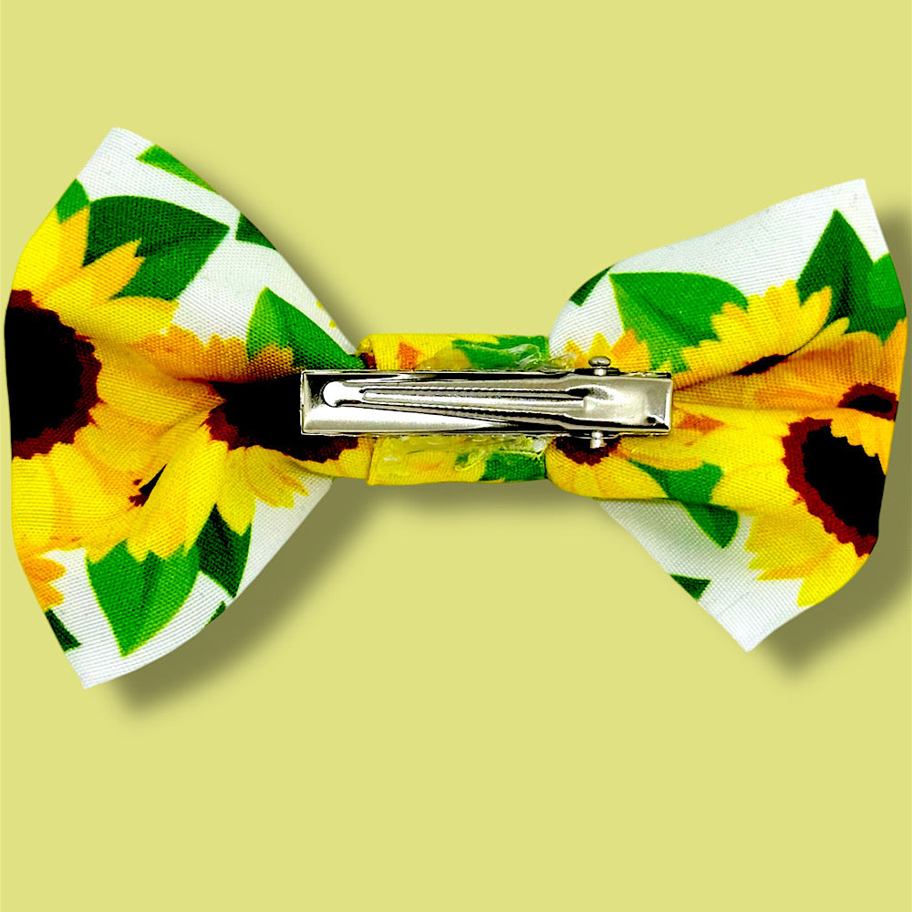Handmade sunflower hair bow.