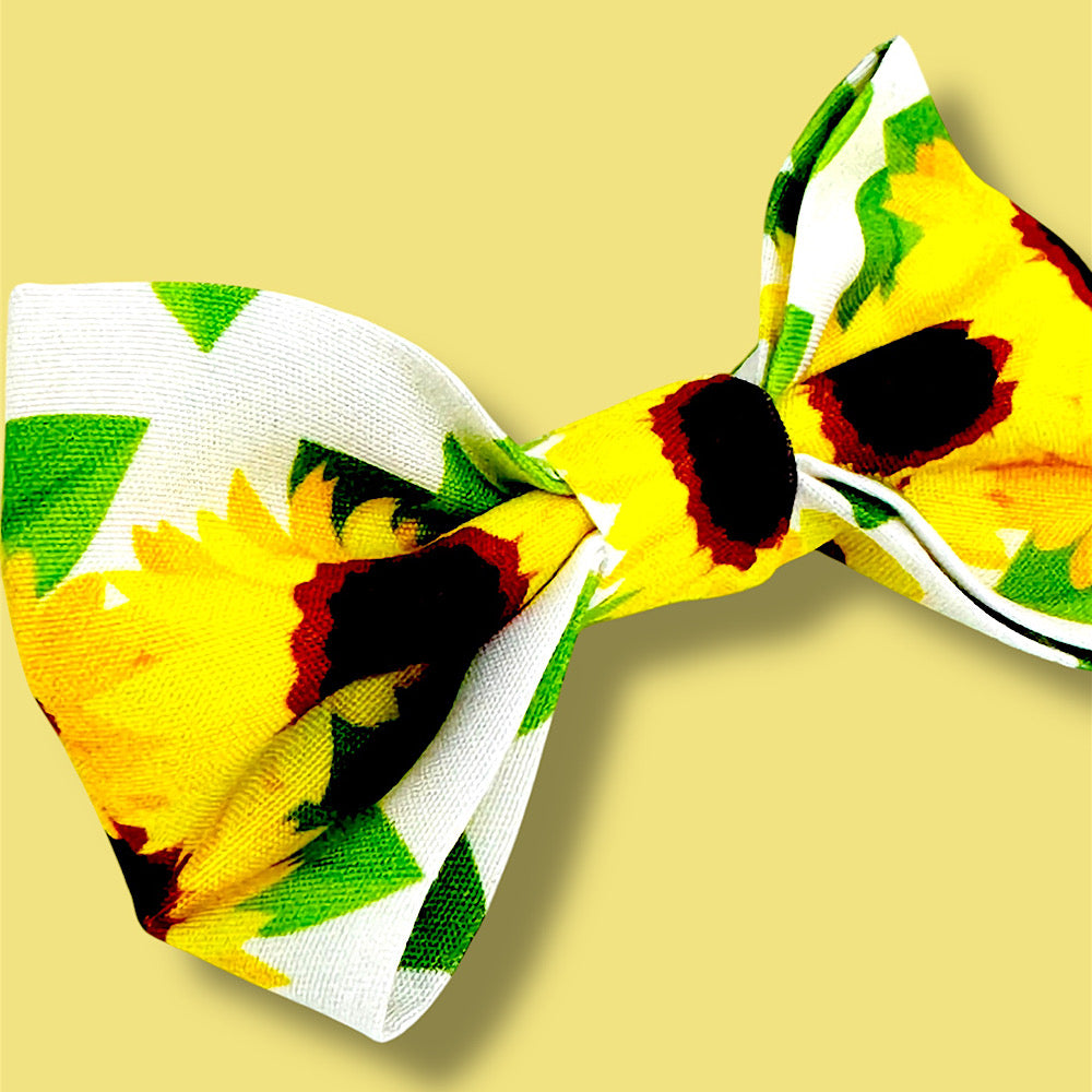 Handmade sunflower hair bow.