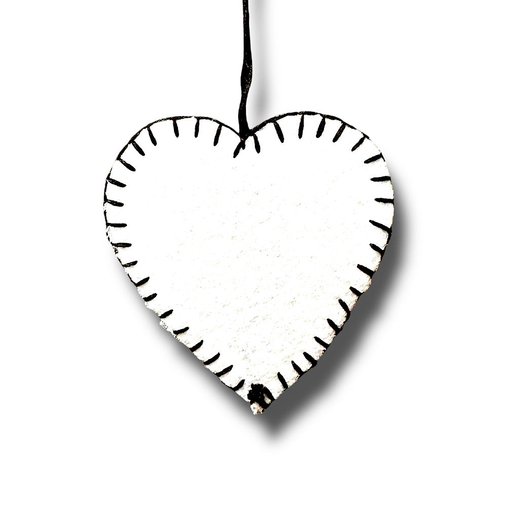 Black and white polka dot hanging heart decoration.