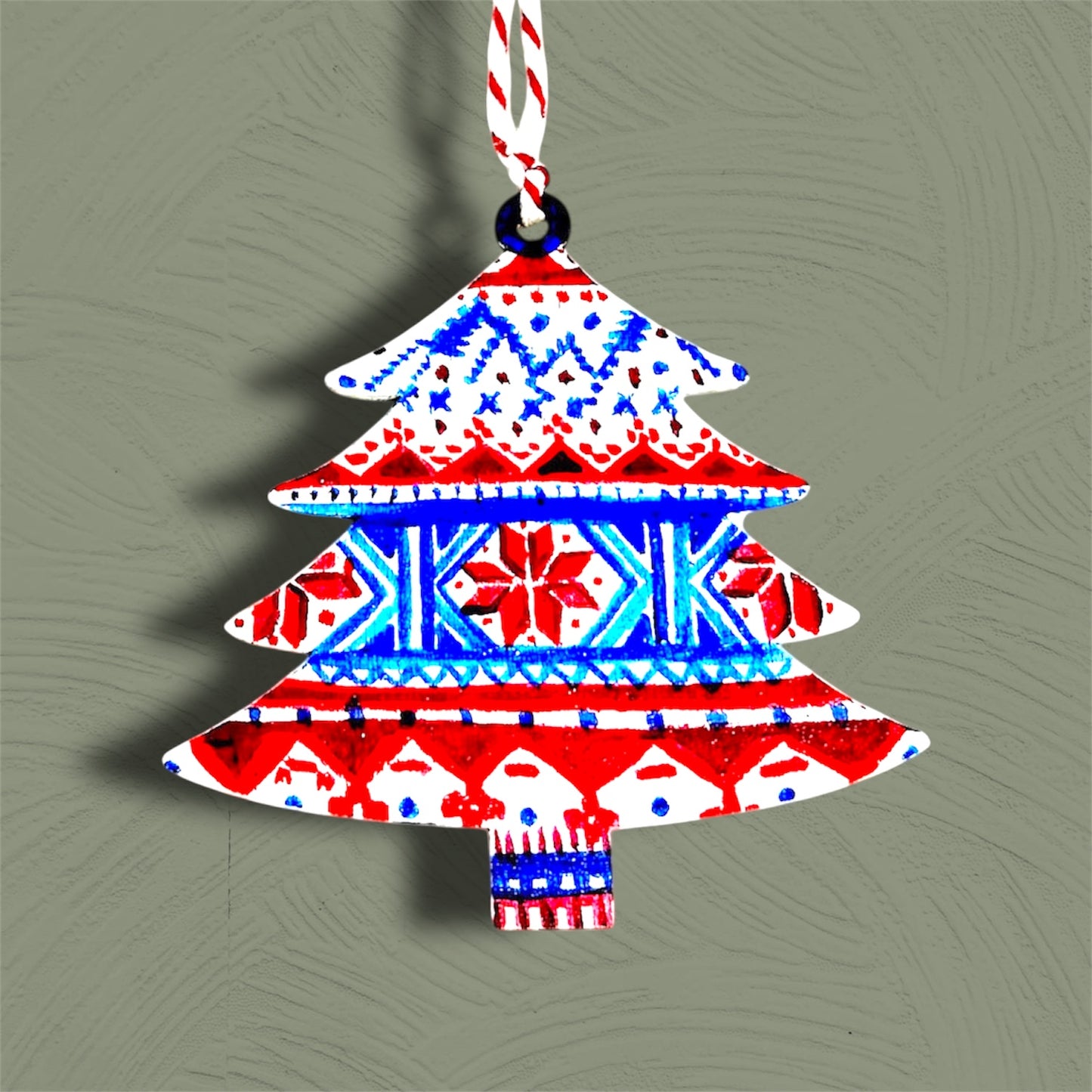 Fairisle style wooden Christmas tree decoration.