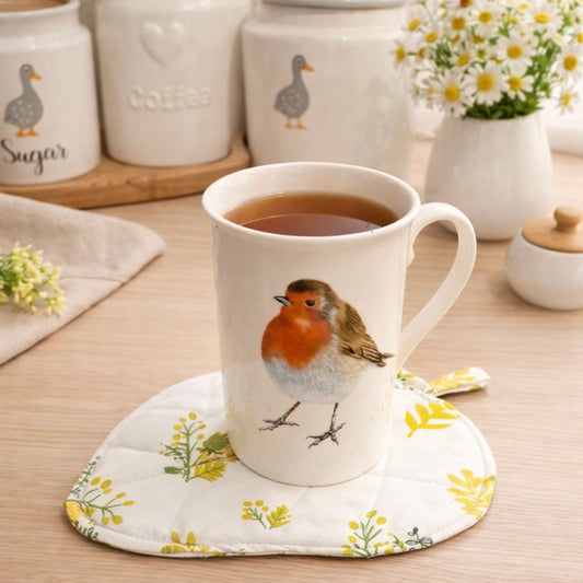 Quilted fabric leaf coaster.