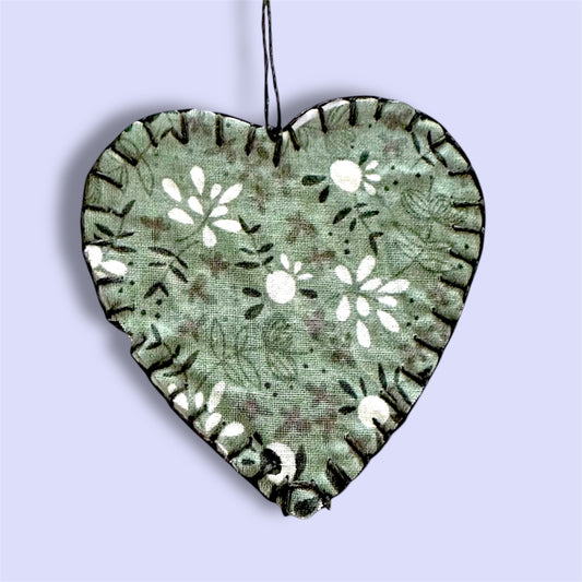 Sage green botanical hanging heart decoration.
